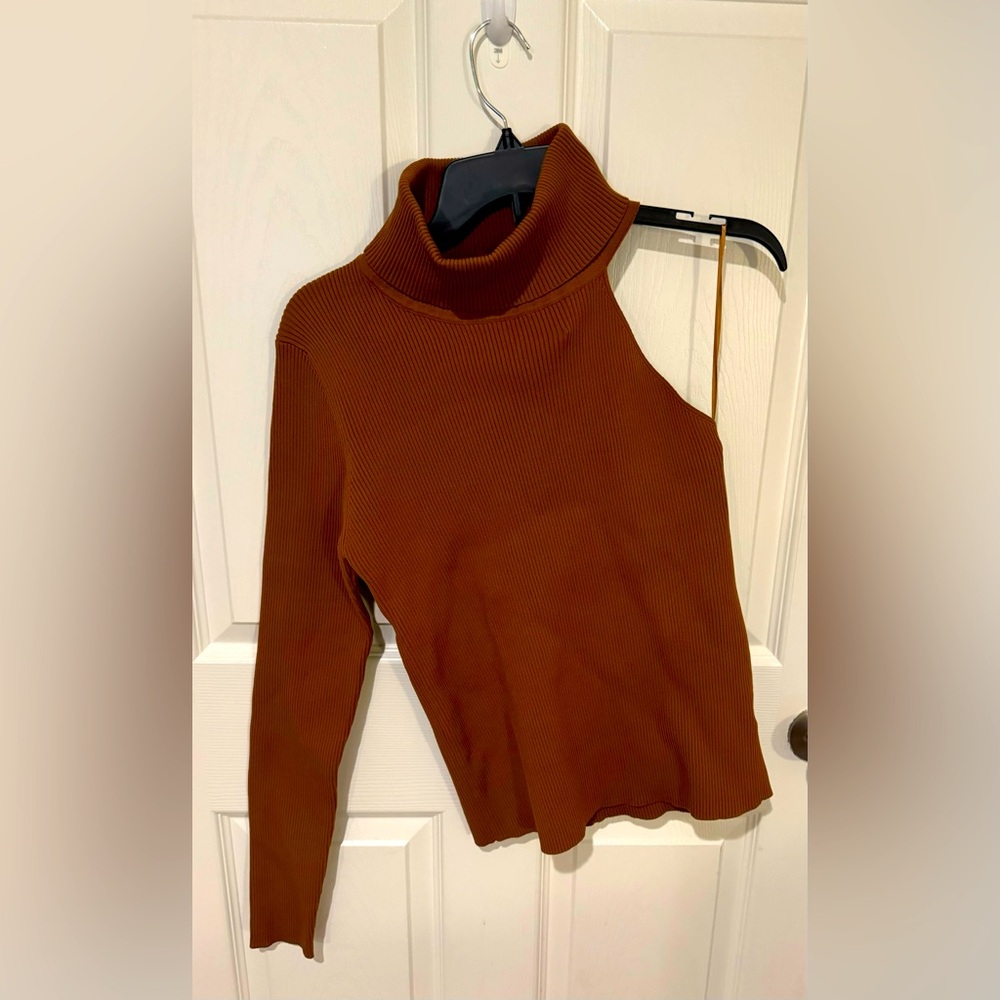 One-shoulder form-fitting turtleneck sweater